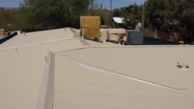 Painted Corrugated Metal Roof in Tucson with a Southwestern Flair