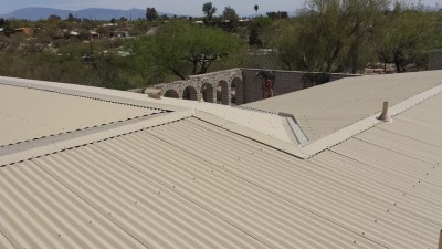 Painted Corrugated Metal Roof in Tucson with a Southwestern Flair