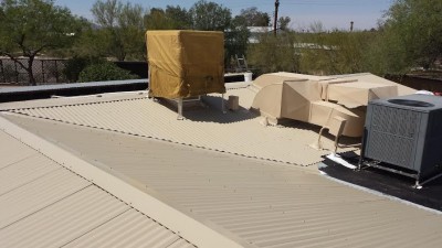 Painted Corrugated Metal Roof in Tucson with a Southwestern Flair