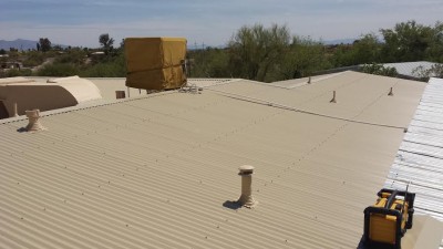 Painted Corrugated Metal Roof in Tucson with a Southwestern Flair